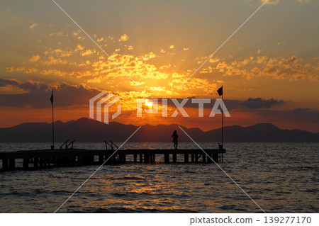 Seaside town of Turgutreis and spectacular sunsets Seaside town of Turgutreis and spectacular sunsets 139277170