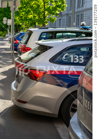 View of many parked police cars near a police station in an Austrian city View of many parked police cars near a police station in an Austrian city 139277209