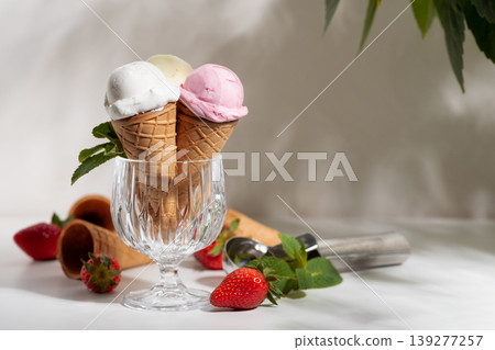 Ice Cream Cones with Strawberries and Mint on White Background Ice Cream Cones with Strawberries and Mint on White Background 139277257