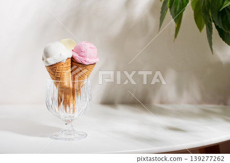 Ice Cream Cones with Strawberries and Mint on White Background 139277262