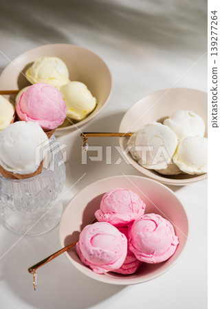 Ice Cream Bowls with Fruit and Mint on White Background Ice Cream Bowls with Fruit and Mint on White Background 139277264