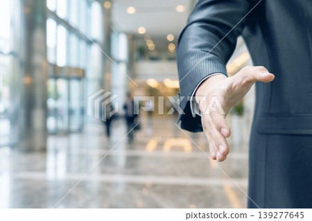 Bizman offers hand Bizman offers hand 139277645
