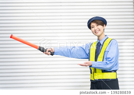 Smiling female security guard Smiling female security guard 139280839
