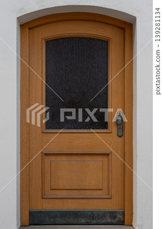 Traditional Wooden Door on White Wall 139281134