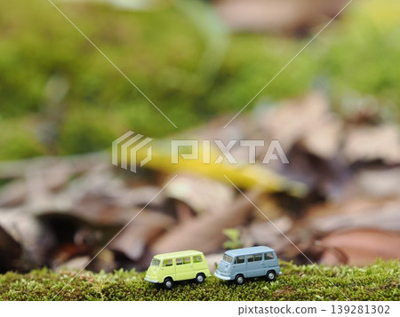 A landscape with miniature cars: Miniature cars on moss (2) A landscape with miniature cars: Miniature cars on moss (2) 139281302