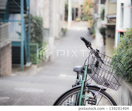 Bicycle parked on a street corner Bicycle parked on a street corner 139281404