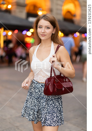 Young woman posing at Royal Square (Placa Real) in Barcelona Young woman posing at Royal Square (Placa Real) in Barcelona 139281625