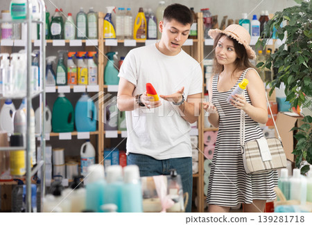 Couple chooses an insect repellent 139281718