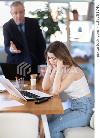 Boss scolding at office employee Boss scolding at office employee 139281740
