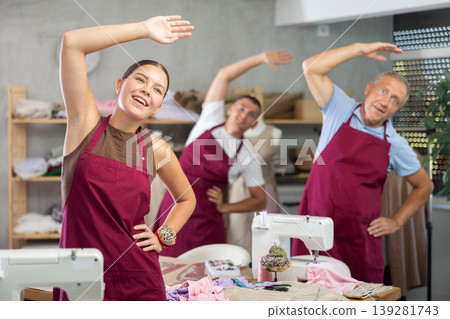 Tailors do a warm-up in the workshop Tailors do a warm-up in the workshop 139281743