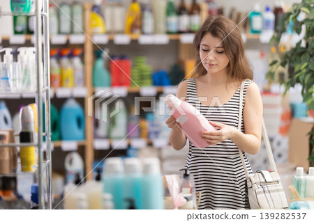 Girl view trademark sign on label, pick eco friendly liquid washing powder Girl view trademark sign on label, pick eco friendly liquid washing powder 139282537