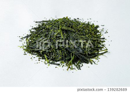 High-quality sencha tea leaves placed against a white background. High-quality sencha tea leaves placed against a white background. 139282689