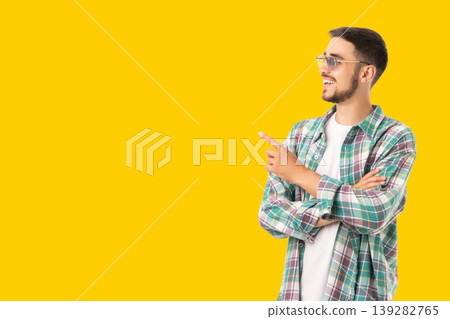 Person gestures happily with arms crossed on bright background 139282765