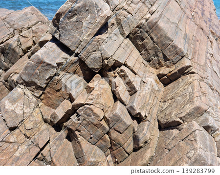 It is a beach with rocks. It is a beach with rocks. 139283799