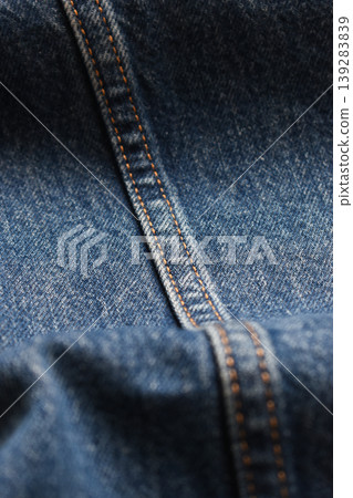 seam of blue denim texture background, jean fashion style seam of blue denim texture background, jean fashion style 139283839