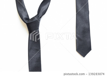 black necktie isolated on white background, father day concept and business style black necktie isolated on white background, father day concept and business style 139283874