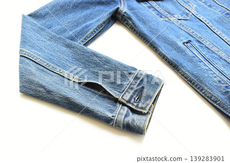 sleeve of blue denim shirt texture isolated on white background, jean fashion style sleeve of blue denim shirt texture isolated on white background, jean fashion style 139283901