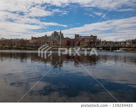 Downtown Sherbrooke Quebec cityscape with river and cloudy sky Downtown Sherbrooke Quebec cityscape with river and cloudy sky 139284483