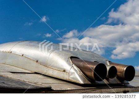 Aircraft jet engines close up on metallic airplane body Aircraft jet engines close up on metallic airplane body 139285377