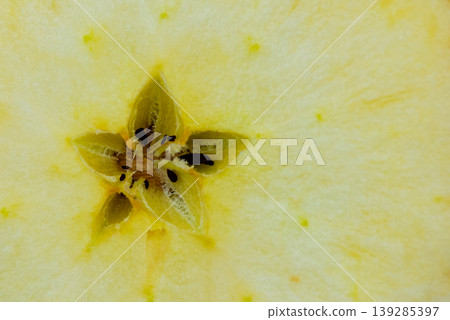 Macro of apple core cross section Macro of apple core cross section 139285397