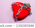 Red heart chained with padlock symbolizing love protection 139285846
