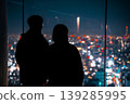A couple gazing at the night view from the observation deck of Shibuya Sky. 139285995