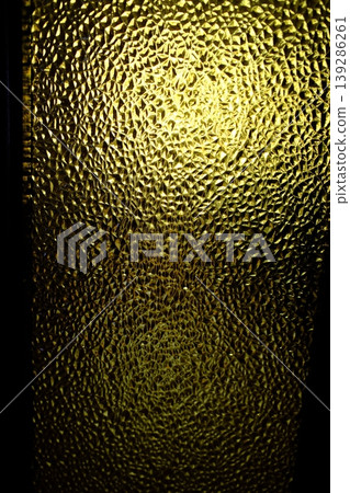 Glass panel reflects light creating abstract patterns with small triangles Glass panel reflects light creating abstract patterns with small triangles 139286261