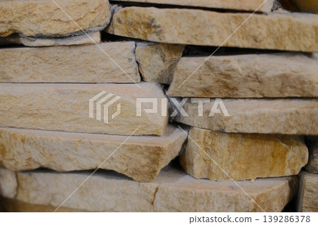 Stacked flagstone creates a wall Stacked flagstone creates a wall 139286378