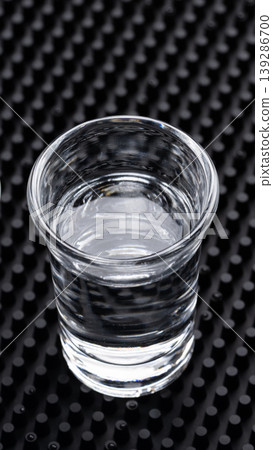 Vertical mobile layout vodka shot glass Vertical mobile layout vodka shot glass 139286700