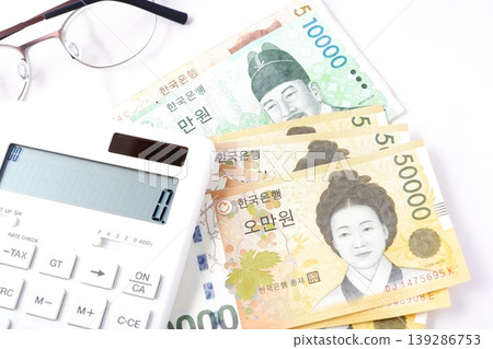 Korean currency, Won KRW banknotes and calculator 139286753