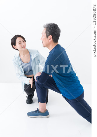 Sports trainer and client Sports trainer and client 139286878