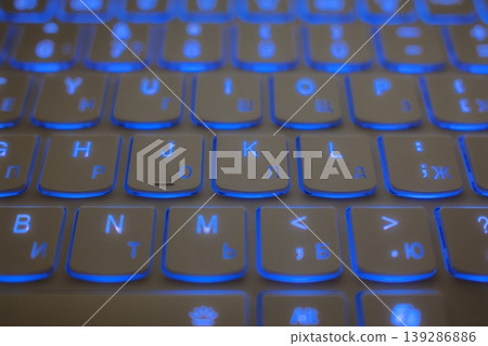 Blue backlit keyboard with English and Cyrillic keys Blue backlit keyboard with English and Cyrillic keys 139286886