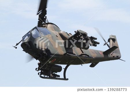 A demonstration flight of the Japan Ground Self-Defense Force's AH-1S Cobra A demonstration flight of the Japan Ground Self-Defense Force's AH-1S Cobra 139288773