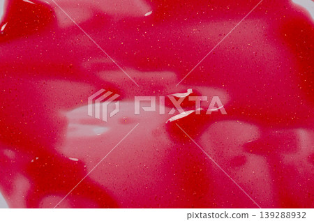 Lip oil, liquid red lipstick. Cosmetic product for lip moisturizing. Lip oil, liquid red lipstick. Cosmetic product for lip moisturizing. 139288932