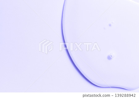 Cosmetic product in the form of a transparent drop. A moisturizing gel or serum for the face. Copy space Cosmetic product in the form of a transparent drop. A moisturizing gel or serum for the face. Copy space 139288942
