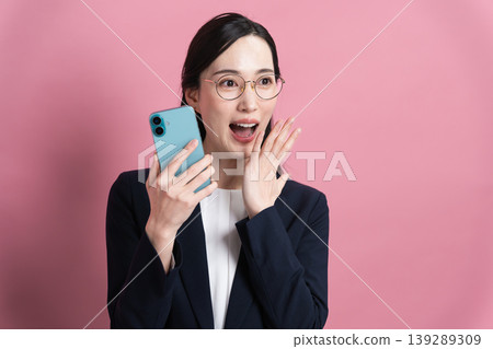 Young woman in a business suit Business image Young woman in a business suit Business image 139289309