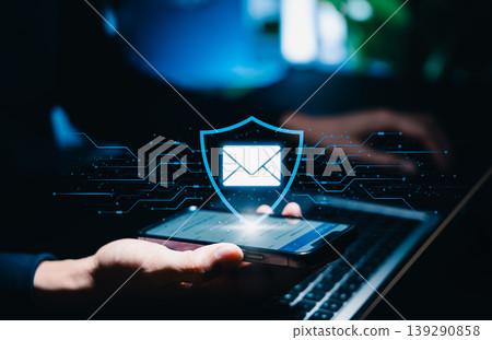 Secure email protection and message security concept. Person holding smartphone with shield and envelope icon. encrypted communication, inbox privacy, cyber defense, secure messaging, data protection Secure email protection and message security concept. Person holding smartphone with shield and envelope icon. encrypted communication, inbox privacy, cyber defense, secure messaging, data protection 139290858