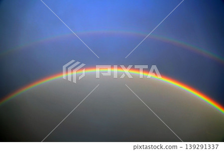 A gigantic double rainbow appeared in the sky. A gigantic double rainbow appeared in the sky. 139291337