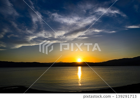 Lake Suwa as the sun sets. Lake Suwa as the sun sets. 139291713