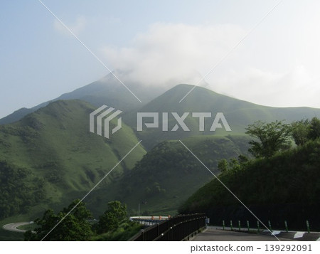 Mount Yufu, also known as Bungo Fuji, as seen from the "Sagiridai" observation deck in Yufuin-cho, Yufu City, Oita Prefecture, which offers a panoramic view of the Yufuin Basin. Mount Yufu, also known as Bungo Fuji, as seen from the "Sagiridai" observation deck in Yufuin-cho, Yufu City, Oita Prefecture, which offers a panoramic view of the Yufuin Basin. 139292091