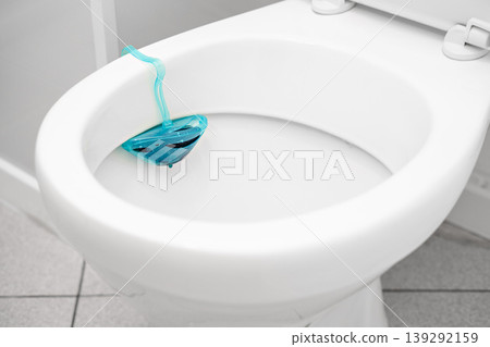 A close-up of blue toilet cleaning tablets A close-up of blue toilet cleaning tablets 139292159