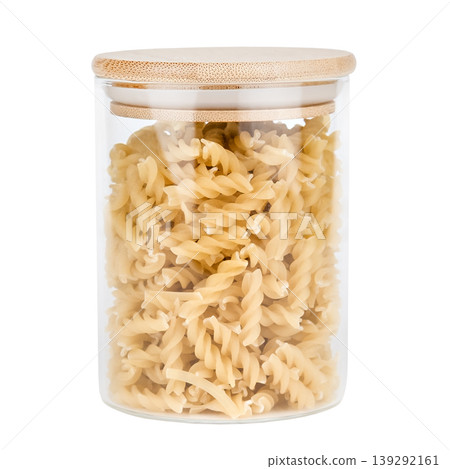 Pasta in a glass jar with a wooden lid isolated on white background Pasta in a glass jar with a wooden lid isolated on white background 139292161
