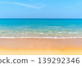 Beautiful beach with clean sand and ocean waves. 139292346