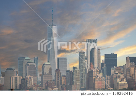 New york, usa august 16,2024. One world trade center rising above the downtown manhattan skyline, capturing the urban landscape and modern architecture at sunset New york, usa august 16,2024. One world trade center rising above the downtown manhattan skyline, capturing the urban landscape and modern architecture at sunset 139292416