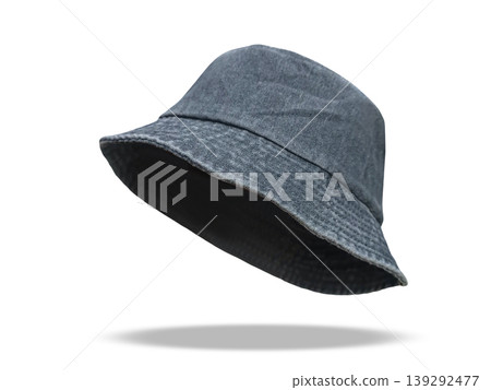 A black bucket hat made of soft, comfortable fabric floats against a white background. A black bucket hat made of soft, comfortable fabric floats against a white background. 139292477