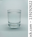 Front view of a clear glass filled with water isolated on a plain white background 139292622