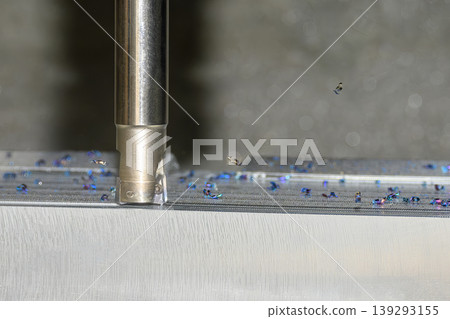 Precision CNC milling machine performing a rough cutting process on mold parts with an indexable tool. Precision CNC milling machine performing a rough cutting process on mold parts with an indexable tool. 139293155