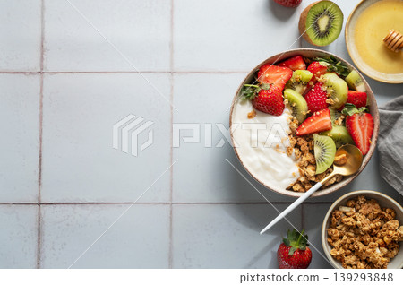Healthy yogurt bowl with granola and fresh berries for clean eating diet Healthy yogurt bowl with granola and fresh berries for clean eating diet 139293848
