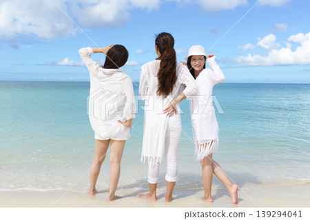 A woman relaxing on a beautiful tropical beach A woman relaxing on a beautiful tropical beach 139294041