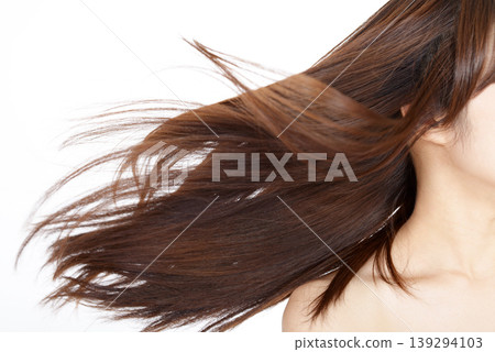 woman with long glossy hair 139294103